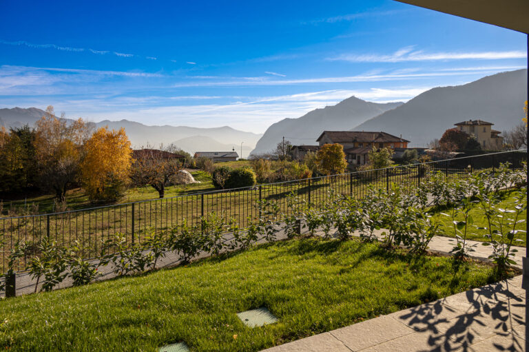 Garden and terrace with a view of the surrounding mountains